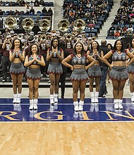 The Virginia Union University Rah Rahs work to rally Panthers fans with cheers from the sidelines.