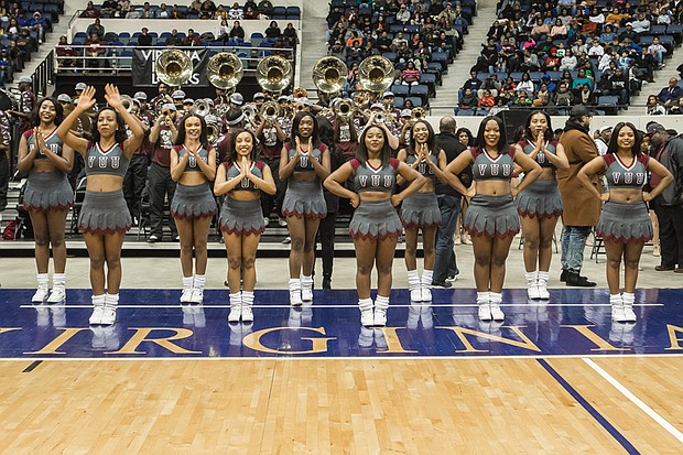 The Virginia Union University Rah Rahs work to rally Panthers fans with cheers from the sidelines.