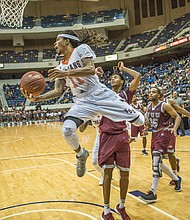 Virginia State University’s Cyonte Melvin takes it to the hoop at the Freedom Classic Festival game Sunday against rival Virginia Union University at the Richmond Coliseum.