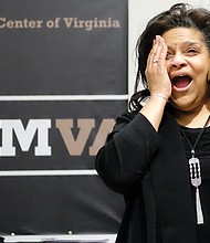 Lauding Lauderdale // Mary C. Lauderdale, operations manager of the Black History Museum and Cultural Center of Virginia, is surprised with a celebration last Friday honoring her 20 years of service at the museum in Jackson Ward. A steady fixture at the museum, Ms. Lauderdale has performed numerous jobs during her tenure, including chief docent, gift shop manager, head of visitor services and museum manager. The surprise event featured African drummers, speeches by area artists and museum board members, presentation of a portrait by Richmond artists Jerome Jones Jr. and his son, Jeromyah Jones, a champagne toast, cake and hors d’oeuvres.
