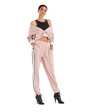fashionable outfit in the JILL Jill Stuart a limited-edition spring ready-to-wear line;
jacket 60, snap pant $50, bra $30 