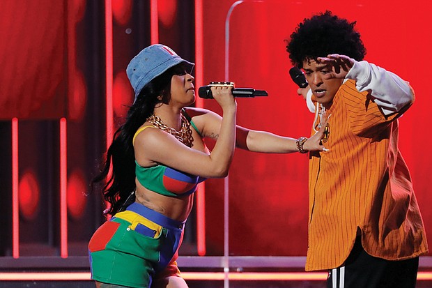 Bruno Mars and Cardi B perform the song, “Finesse,” during Sunday’s 60th Annual Grammy Awards. Mr. Mars took home six awards, including for song of the year for “That’s What I Like” and record and album of the year for “24K Magic.”