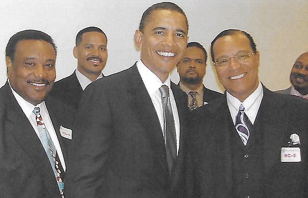 This 2005 photo shows U.S. Sen. Barack Obama with Minister Louis Farrakhan during a Congressional Black Caucus meeting.