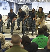 GULF OF ADEN (Feb. 23, 2017) Sailors and a Marine perform a step dance during the African American and Black History Month celebration aboard the amphibious assault ship USS Makin Island (LHD 8). The ship is deployed in the U.S. 5th Fleet area of operations in support of maritime security operations designed to reassure allies and partners, and preserve the freedom of navigation and the free flow of commerce in the region. (U.S. Navy photo by Mass Communication Specialist 3rd Class Devin M. Langer)