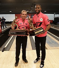 Chris Paul and Norm Duke with championship trophy.