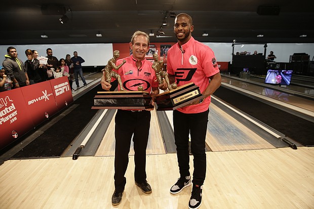 Chris Paul and Norm Duke with championship trophy.