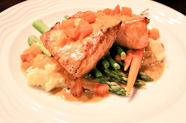 Lakeway Resort and Spa's Travis Restaurant's oven roasted salmon paired with mashed potatoes and asparagus