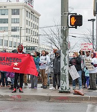 In remembrance and protest // Fast food workers show their support for higher wages and union rights during a lunch hour protest Monday on West Broad Street near the Boulevard in Richmond, marking the 50th anniversary of the historic Memphis sanitation workers strike. On Feb. 12, 1968, hundreds of African-American sanitation workers went on strike to decry harsh working conditions and to demand a raise to $2 an hour. Their action, triggered by the deaths of two men on the job, prompted Dr. Martin Luther King Jr. to travel to Memphis twice in support of the strikers. His last speech, “I’ve Been to the Mountaintop,” was delivered there on April 3, 1968; he was assassinated the next day. On Monday, protests were
