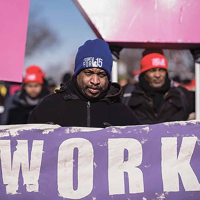 Local fast-food workers recently rallied at a local Chicago McDonald’s in honor of the 50th Anniversary of the historic 1968 Memphis sanitation strike and continued the on-going national fight for $15 an hour. Photo Credit: The Fight for $15