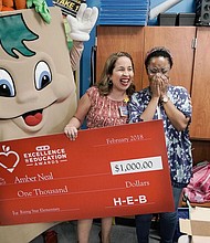 Amber Neal being surprised by H-E-B
