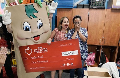 Amber Neal being surprised by H-E-B