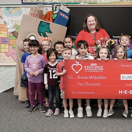 Katy ISD's Bonnie McSpadden was surprised by H-E-B