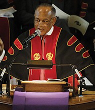 Dr. Dwight C. Jones, senior pastor at First Baptist Church of South Richmond and a former Richmond mayor, talks about his mentor, Dr. Wyatt Tee Walker, during the memorial service.