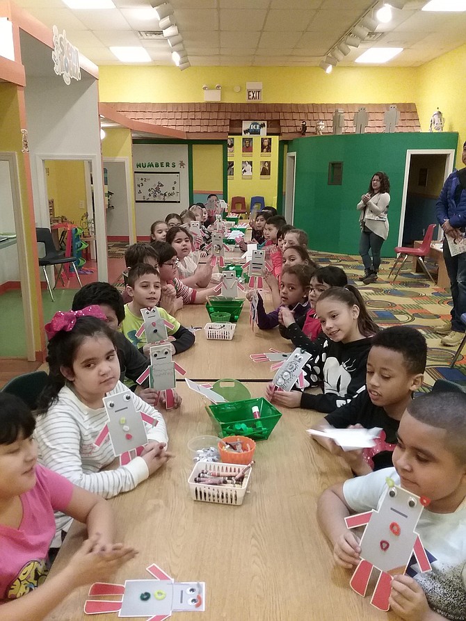 Photo of Children participating in hand on activities at the Museum Campus. Photo Credit: Bronzeville Children's Museum