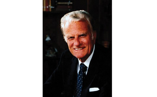 Thousands of people from all walks of life filed slowly past the casket of the Rev. Billy Graham on Monday ...