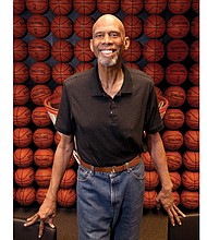 Author, activist and former NBA basketball player Kareem Abdul-Jabbar poses at the Newport Beach, Calif., offices of the Skyhook Foundation, the nonprofit he started several years ago to provide educational opportunities for elementary students. 