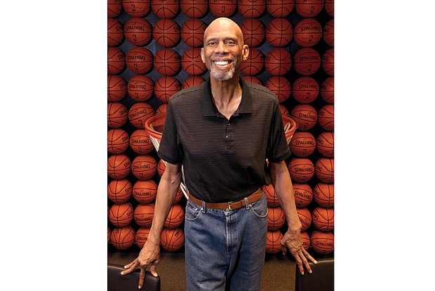 Author, activist and former NBA basketball player Kareem Abdul-Jabbar poses at the Newport Beach, Calif., offices of the Skyhook Foundation, the nonprofit he started several years ago to provide educational opportunities for elementary students. 