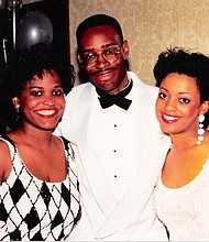Susan Bynam, Larry Green, and Rhonda Williams celebrating their graduation from Texas Southern University's Thurgood Marshall Law School