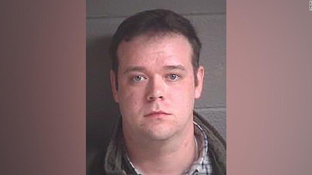 Asheville police officer resigns after beating and choking suspected jaywalker 