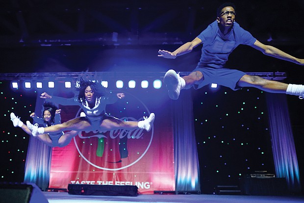 Cheerleaders from various school squads show off their moves in the CIAA Cheerleading Competition.