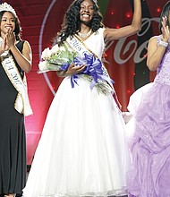 Miss Shaw University Briona May beams after being crowned 2018 Miss CIAA on Saturday at CIAA Fan Fest. The senior from Hampton, who is majoring in social work, also won a $2,500 Food Lion scholarship.