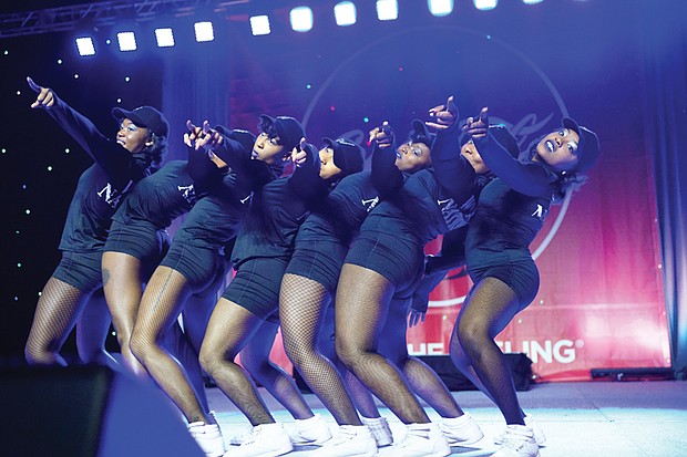 Cheerleaders from various school squads show off their moves in the CIAA Cheerleading Competition. The Virginia State University Woo Woos