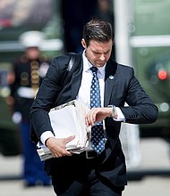 President Donald Trump's longtime personal aide John McEntee was fired and escorted from the White House on Monday, three sources with knowledge of the matter told CNN.  CREDIT: Brendan Smialowski/AFP/Getty Images
