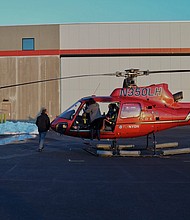 When emergency workers dove into the frigid waters of New York's East River to reach a downed helicopter on Sunday evening, they found a disturbing scene.