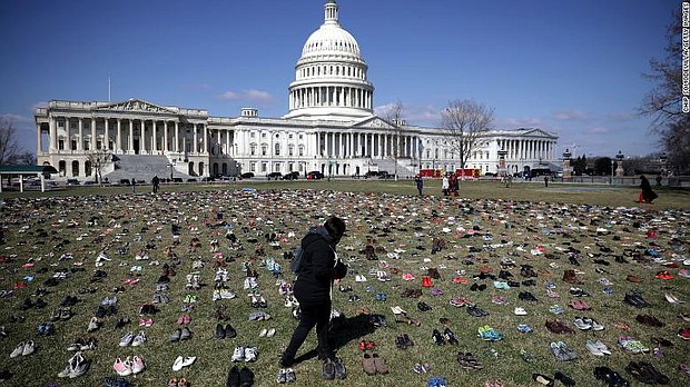 7,000 pairs of shoes placed on Capitol lawn