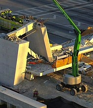 Drone captures scene where a pedestrian bridge collapsed at Florida International University in Miami.