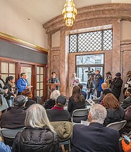 In his honor // Ahead of the unveiling, below, Councilwoman Robertson offers remembrances of the late Mr. Boone and his impact as a crusading journalist to about 75 well-wishers and reporters during a ceremony inside the Free Press building. Other speakers included Mayor Stoney, Mr. Boone and Free Press Managing Editor Bonnie V. Winston.