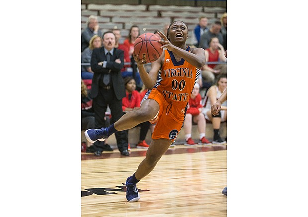 Virginia State University’s Aja Robertson goes up for a basket in last Friday’s game against Edinboro University of Pennsylvania at Barco-Stevens Hall on Virginia Union University’s campus.