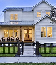 Photo courtesy of Houston Heights Association.
 
The newest home on the tour, this two-story farmhouse at 701 E. 8-1/2 St., was built in 2017 by the current owners who added historical touches through design and reclaimed ceiling beams and wood floors.
 