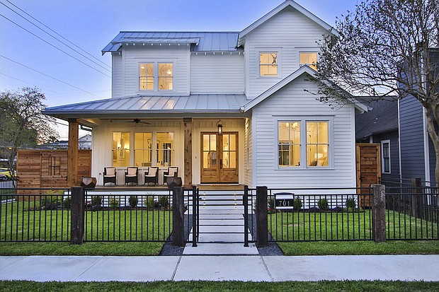 Photo courtesy of Houston Heights Association.
The newest home on the tour, this two-story farmhouse at 701 E. 8-1/2 St., was built in 2017 by the current owners who added historical touches through design and reclaimed ceiling beams and wood floors.
