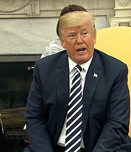 US President Donald Trump congratulated Russian President Vladimir Putin on his re-election despite the warnings from multiple national security advisers and briefing materials that said "DO NOT CONGRATULATE," The Washington Post reported Tuesday evening.