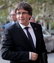 Catalonia's former separatist leader Carles Puigdemont was detained in Germany on Sunday, after crossing the border from Denmark, his lawyer announced on Twitter./AFP/Getty Images