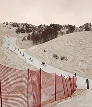 Snow appears to have an orange/reddish color in Sochi, Russia, on Saturday. The colored snow is due to sand and dust from North Africa being picked up by a storm system.