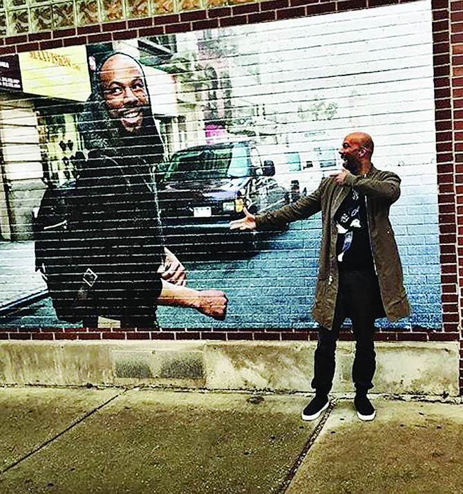 The mural of Chicago native, Common, located at 79th St. and Evans St. (pictured) represents the eclectic culture and artists living in the Greater Chatham community.