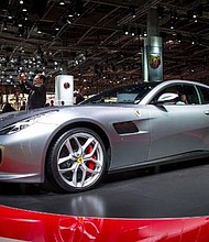 The Ferrari GTC4Lusso, shown here at the 2016 Paris Motor Show, has already moved the Ferrari out of the realm of pure sports cars.