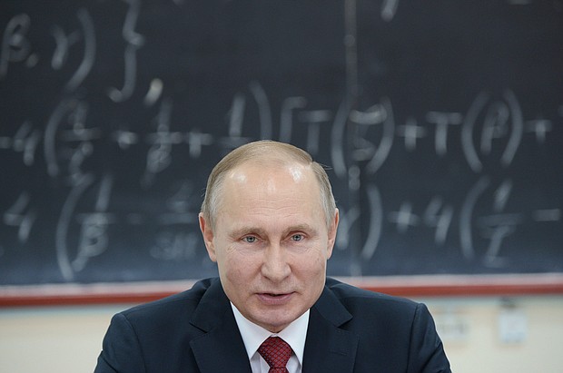 Russian President Vladimir Putin speaks during a meetng with scientists from the Russian Academy of Sciences' Siberian Branch in Novosibirsk in February./ Alexey Nikolsky/AFP/Getty Images