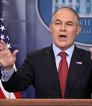 The White House is "looking into" embattled Environmental Protection Agency Administrator Scott Pruitt's housing situation amid reports that he rented a room in Washington, DC, from the family of an energy lobbyist, a person familiar with the matter told CNN./Getty Image