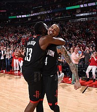 HOUSTON, TX - MARCH 30: James Harden #13 and Gerald Green #14 of the Houston Rockets celebrate a win against the Phoenix Suns on March 30, 2018 at the Toyota Center in Houston, Texas. Gerald Green (15 points) made a three-point field goal at the buzzer to propel the Rockets to their 11th consecutive win./Getty Image