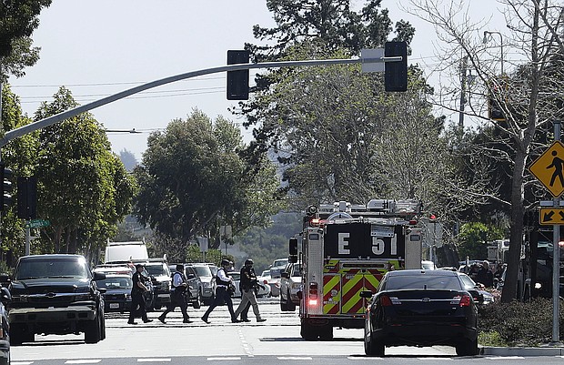 At least three people were wounded and the suspected shooter, a woman, was found dead on the campus of the YouTube headquarters, San Bruno, California, Police Chief Ed Barberini told reporters Tuesday.