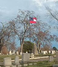 The first national Confederate flag, spotted last week, flies in the city-owned Riverview Cemetery in Richmond’s West End.