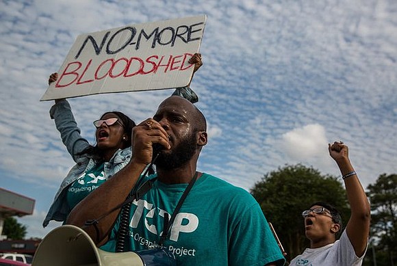 Several from the Texas Organizing Project were calling for justice at the intersection where Danny Ray Thomas lost his life. …