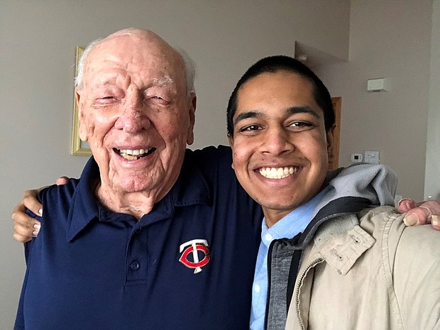 Rishi Sharma, pcitured with veteran Arnold Seretan, is on a mission to interview every WWII combat veteran he can.