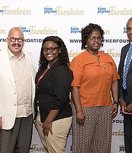 Tom Joyner, nationally syndicated radio show host and founder and chairman of the Tom Joyner Foundation standing next to Full Ride scholarship winner Daudreanna Baker of Hazlehurst, Miss., her mom, Lillian Tillman, and the scholarship banquet keynote speaker Dr. Walter Kimbrough, president, Dilliard University.
Photo credit: Jesse Hornbuckle