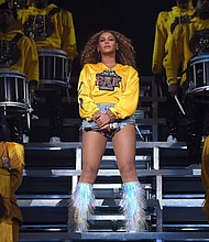 Beyoncé‘s headlining performance at Coachella, one year after it was originally scheduled. Force and determination were evident throughout the two-hour concert. (Credit: Larry Busacca/Getty Images)