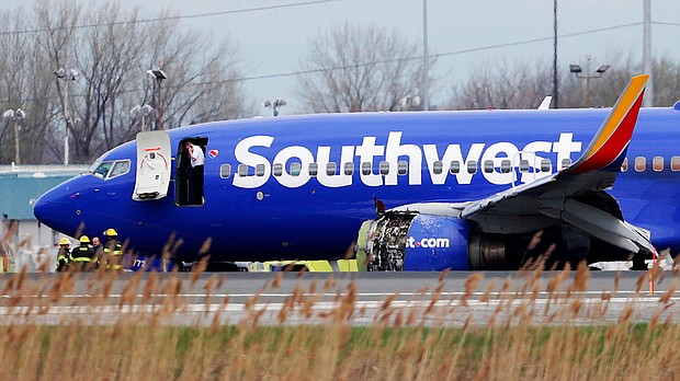 A Southwest Airlines plane flying from New York to Dallas had to make an emergency landing Tuesday morning in Philadelphia after one of its engines was damaged, according to the Federal Aviation Administration.