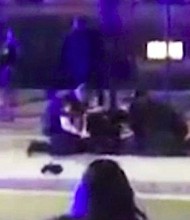 Cambridge police have launched an internal investigation after a video showed officers tackling and punching a naked black Harvard student who police said was resisting arrest.